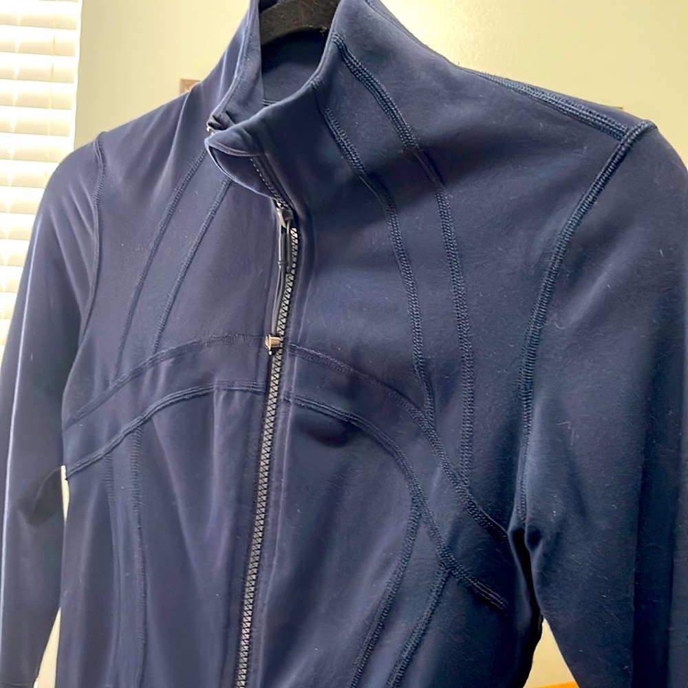 Lululemon size 4. Navy jacket excellent condition